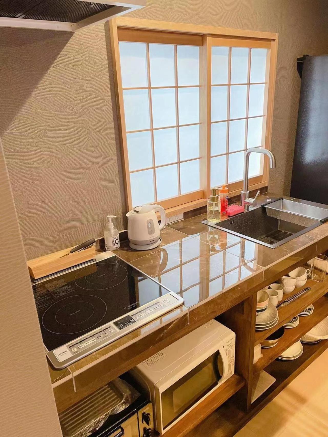 静響の宿 Silent Echo Inn โอซาก้า ภายนอก รูปภาพ